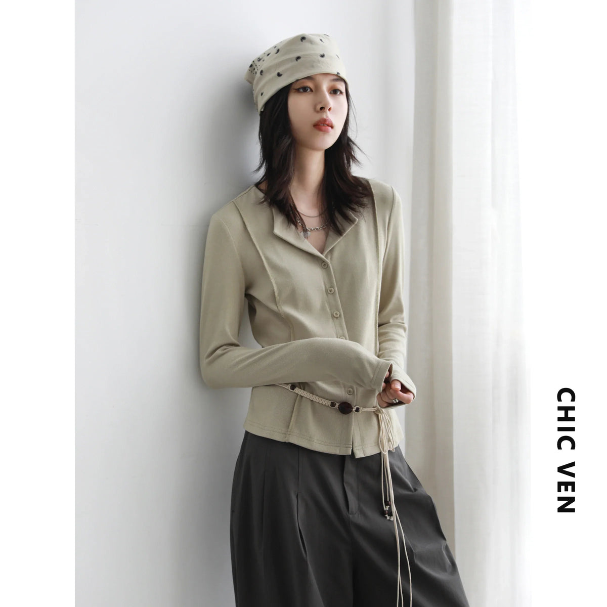 Cardigan en maille pour femme à manches longues, avec col et patte de boutonnage