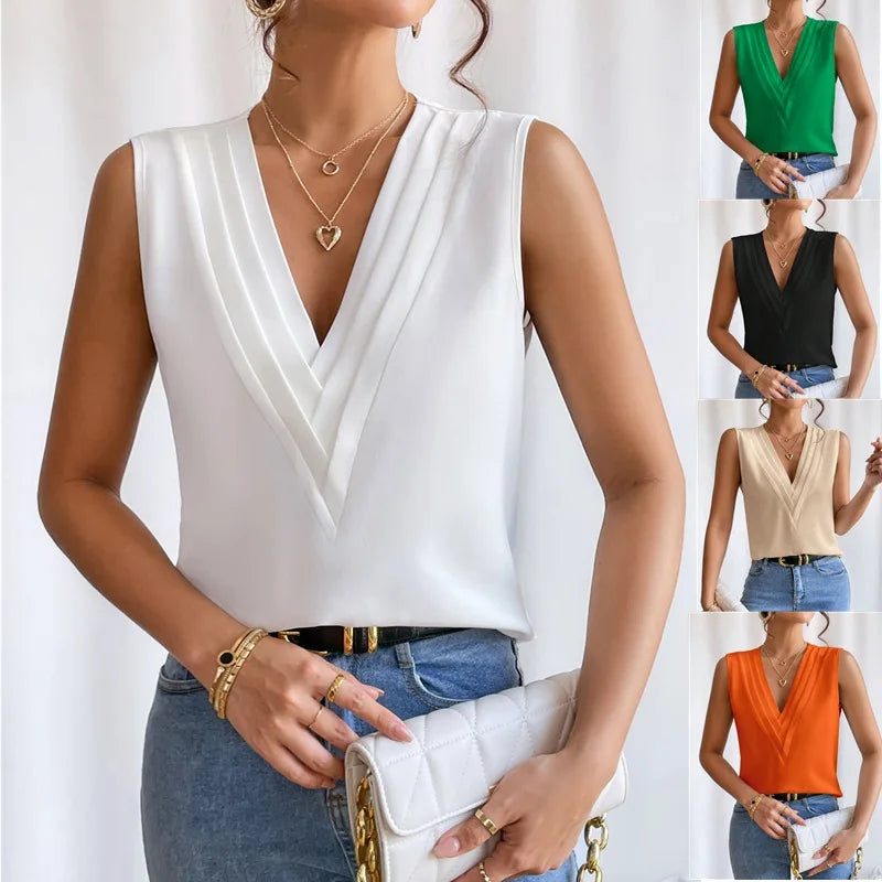 Dam elegant ärmlös blus med veckdesign för kontor och vardag