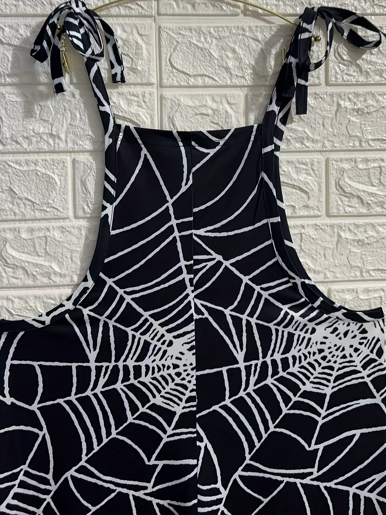 Damen Jumpsuit Spinnennetz-Muster Schwarz Trägerhose