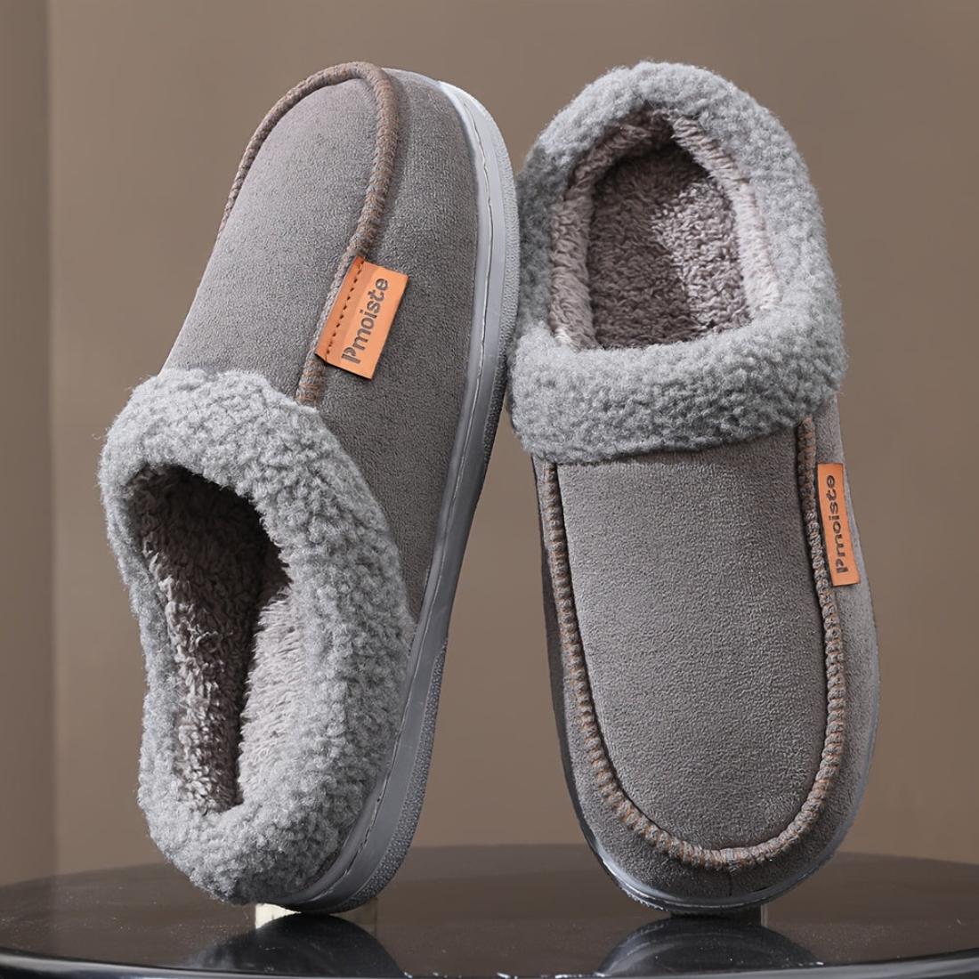 Pantuflas forradas con costura decorativa negras
