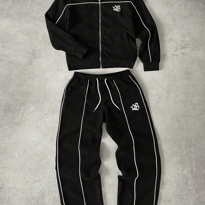 Tuta da ginnastica unisex con giacca con cerniera e pantaloni, bande a contrasto, applicazione con logo