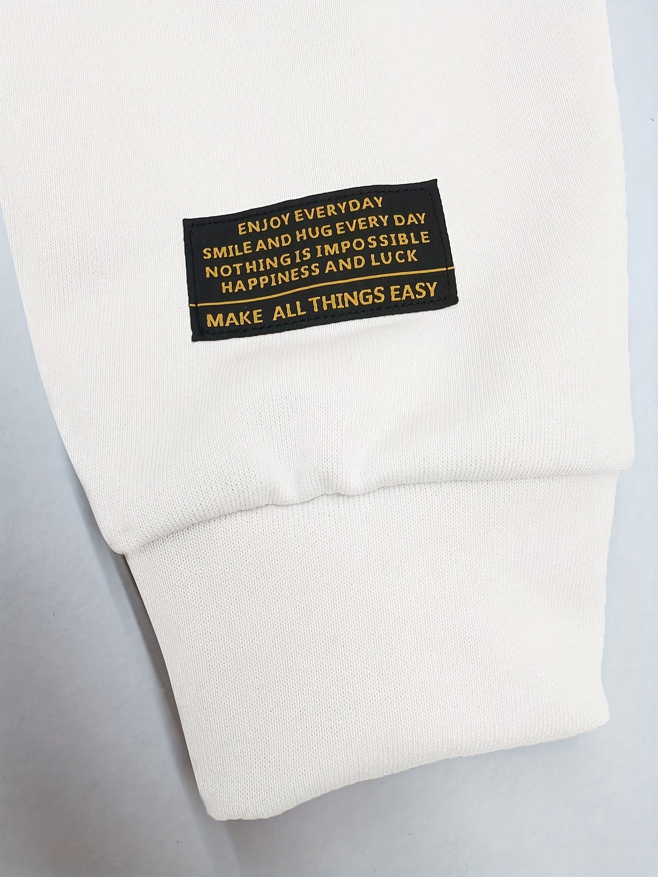 Camiseta unisex de manga larga con efecto de capas, negra y blanca