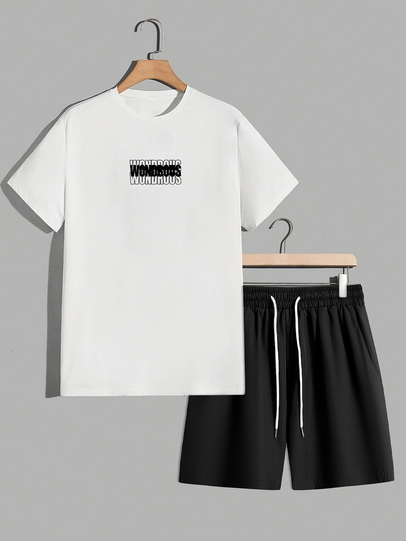 Męski zestaw streetwear z koszulką z grafiką i szortami – nowoczesny casualowy look, styl miejski