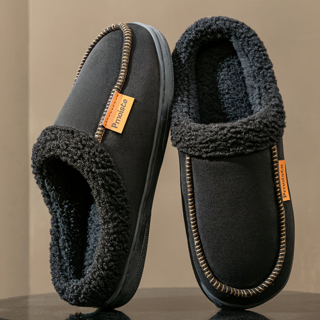 Pantuflas forradas con costura decorativa negras