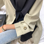 Oversized trenchcoat voor dames met pas in contrastkleur en oprolbare mouwen