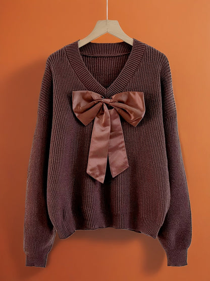 Pullover da donna in maglia grossa con scollo a V e grande fiocco