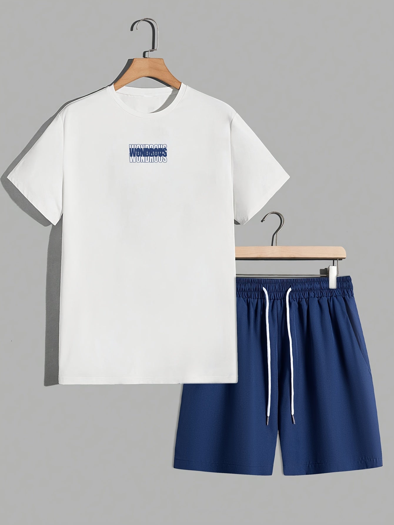 Męski zestaw streetwear z koszulką z grafiką i szortami – nowoczesny casualowy look, styl miejski