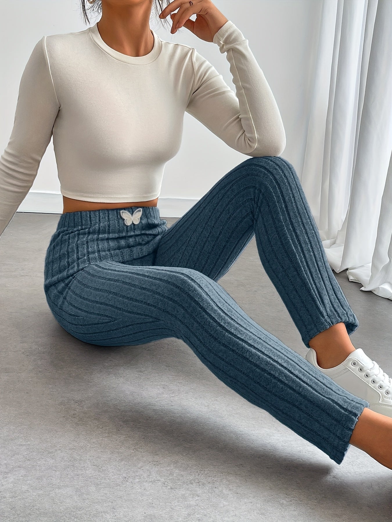 Leggings da donna a coste con vita alta e dettaglio a farfalla
