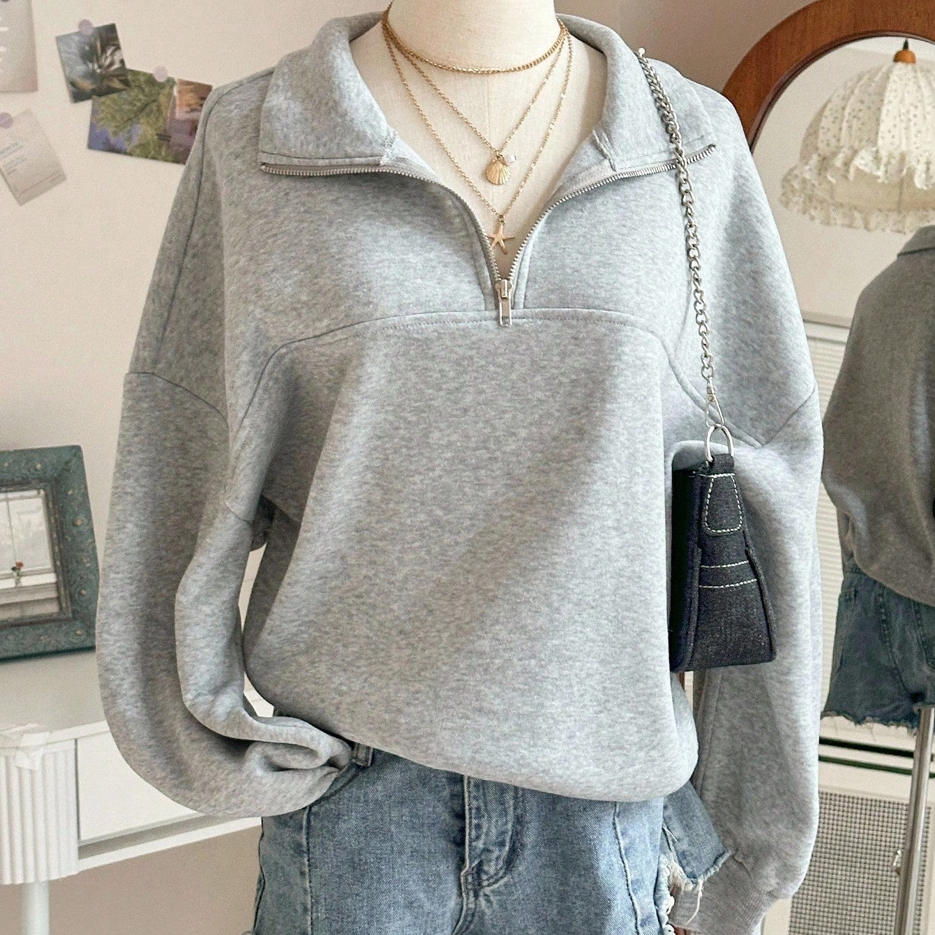 Grijze sweater met ritskraag