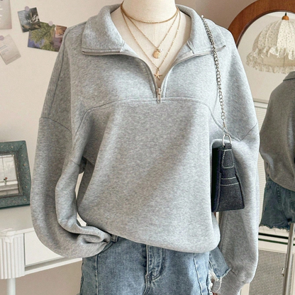 Grijze sweater met ritskraag