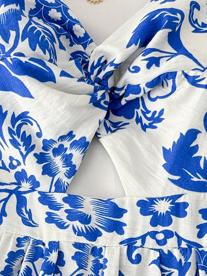 Robe midi d'été pour femme avec motif floral et découpe, tendance et féminine, idéale pour les loisirs et les vacances