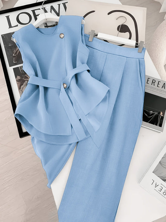 Conjunto de dos piezas para mujer – Elegante atuendo de negocios con blusa asimétrica y pantalones anchos – Moderno y estilizado para oficina y eventos