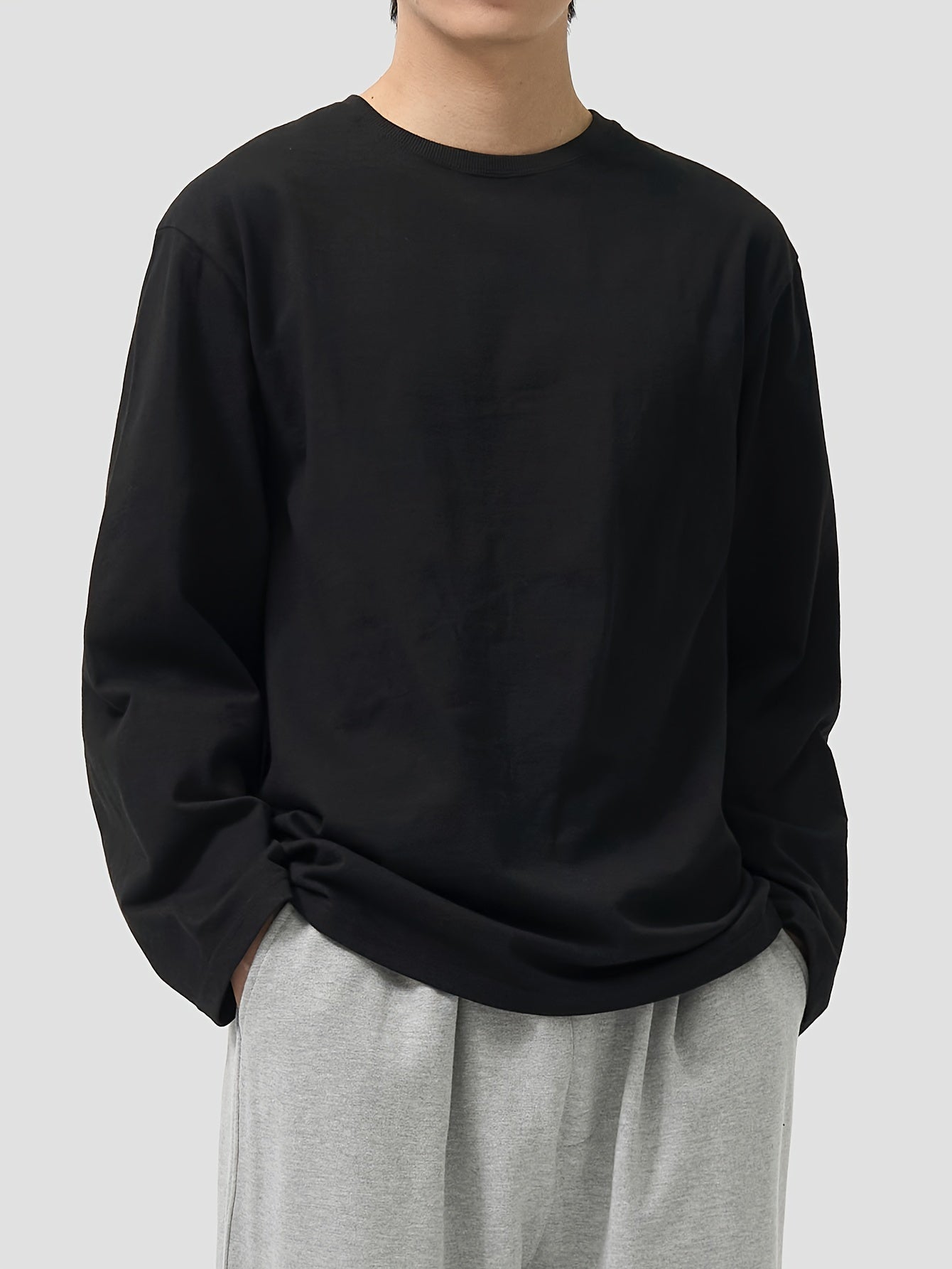 Camiseta unisex de manga larga, cuello redondo, negra y extragrande