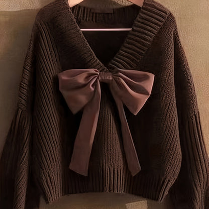 Pullover da donna in maglia grossa con scollo a V e grande fiocco