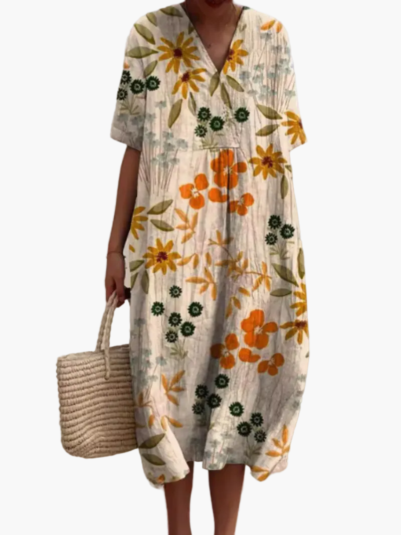 Dame sommerkjole i løs boho-stil – Fritidskjole med blomsterprint og V-udskæring, ideel til strand og hverdag
