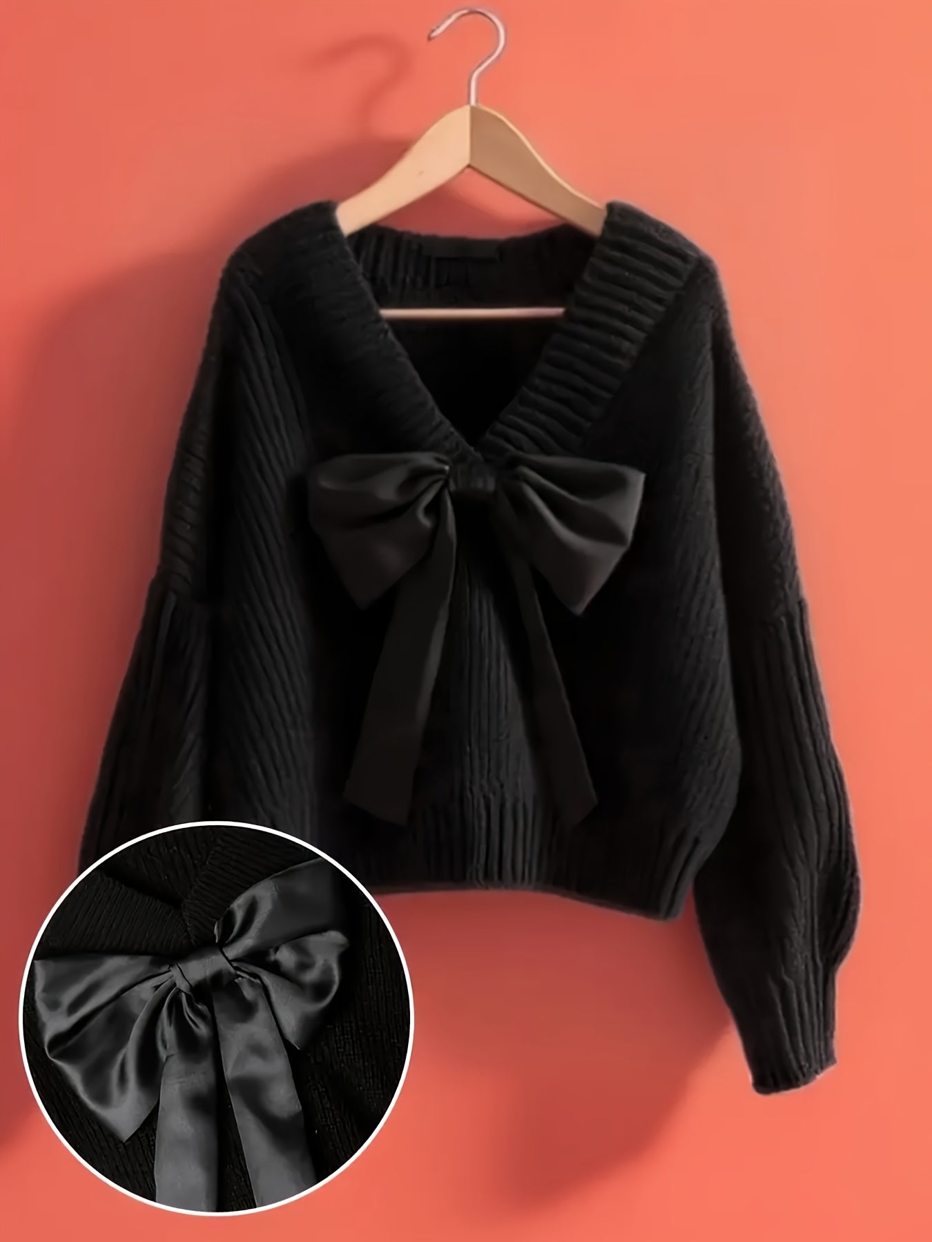 Pullover da donna in maglia grossa con scollo a V e grande fiocco