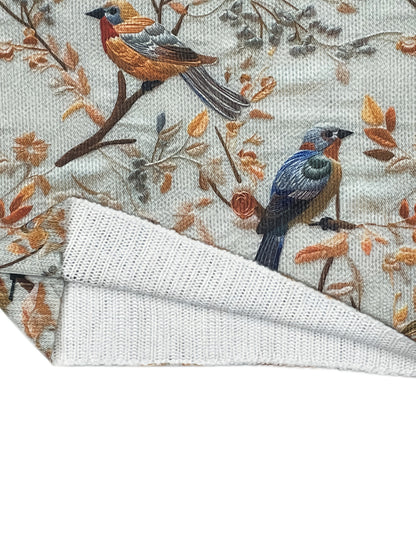 Damegenser med fugleprint og høy krage – Elegant høst/vinter-look