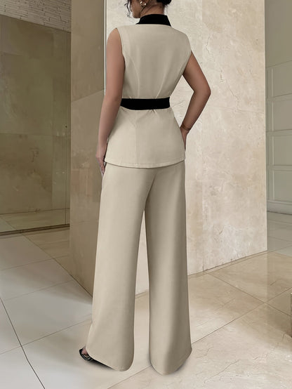 Completo elegante da donna con pantaloni, cintura e blazer senza maniche – Business & Ufficio