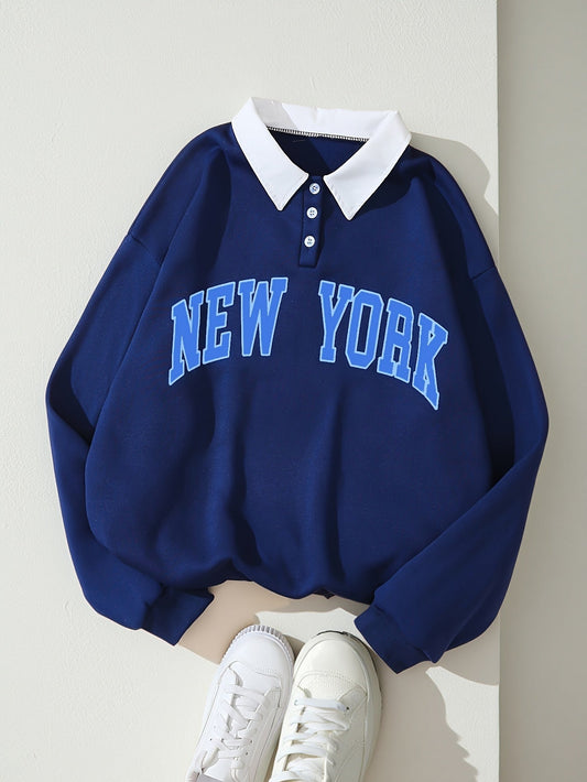 Dunkelblauer Pullover mit New York Schriftzug Kragen und Knöpfen