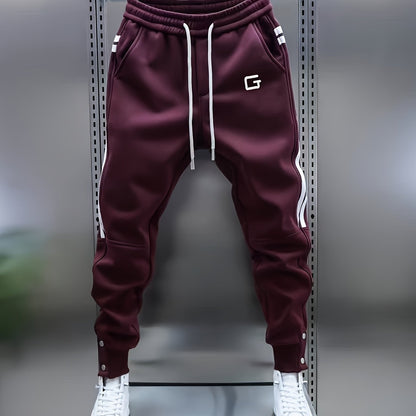 Pantaloni da jogging da uomo sportivi con bande laterali, coulisse e bottoni in vita