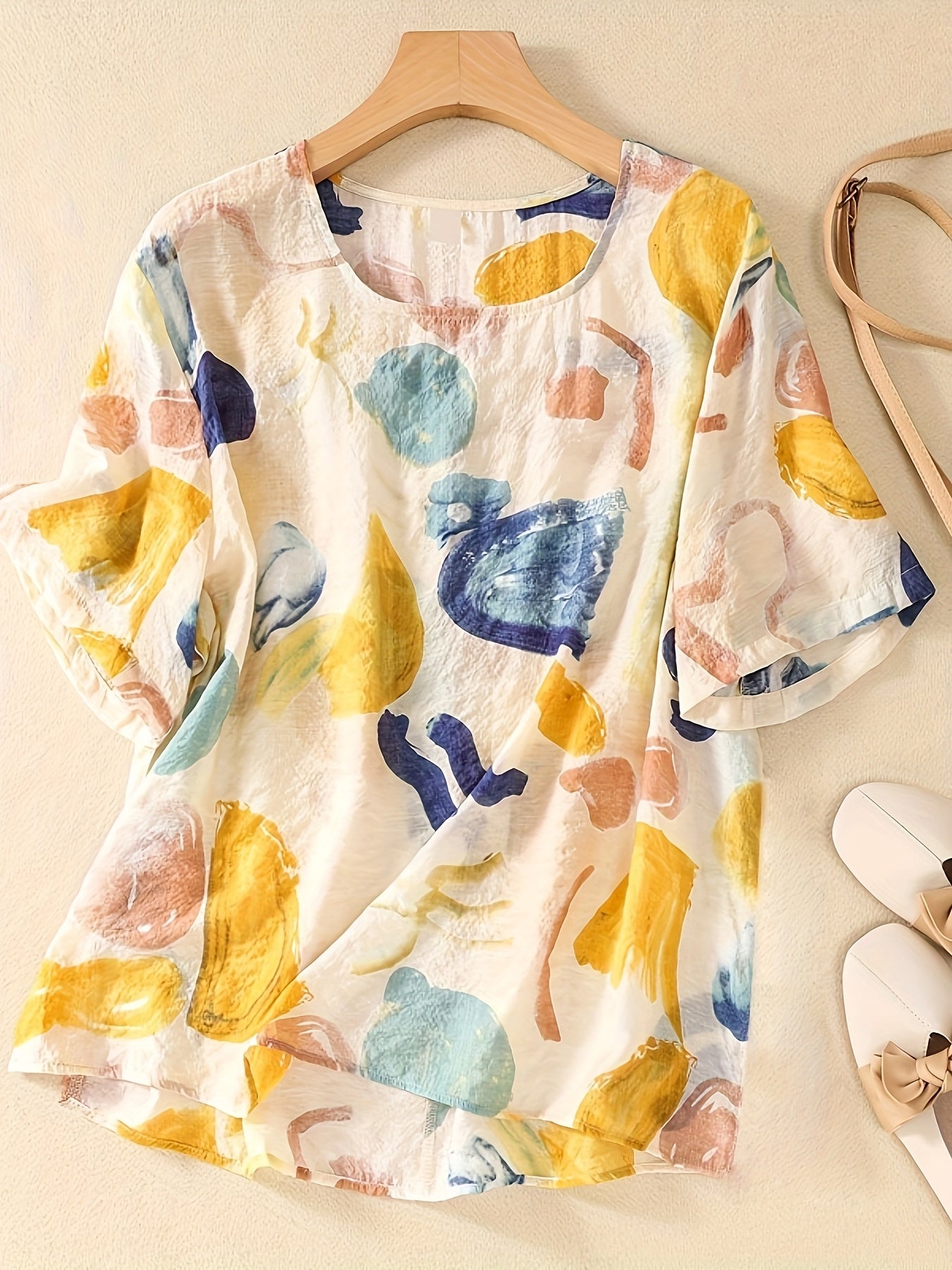 Blusa de mujer con estampado abstracto y corte holgado – Estilo artístico casual para el día a día