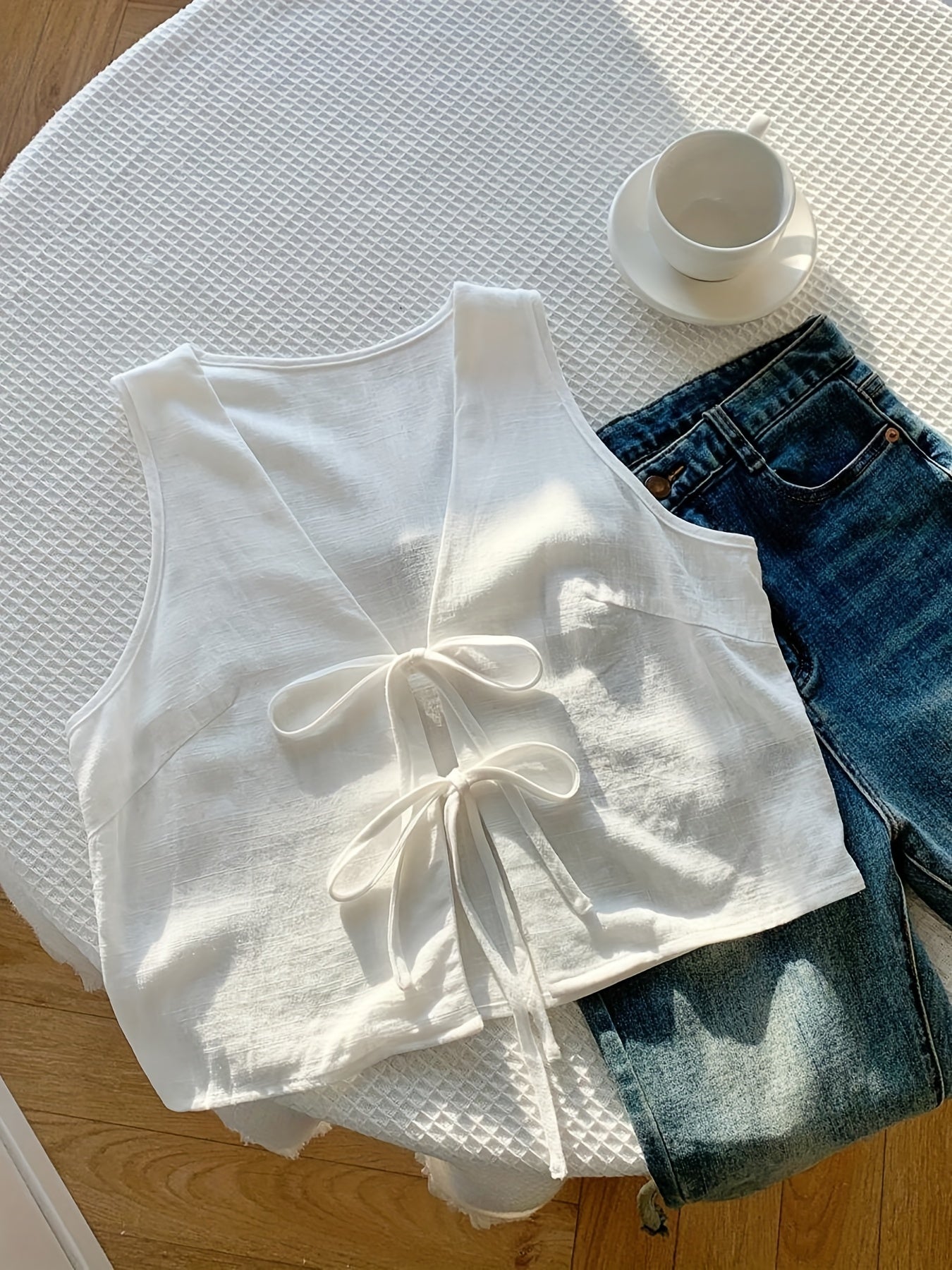 Gilet sans manches pour femme avec détail nœud et encolure en V – couche d'été à la mode pour les loisirs et les vacances