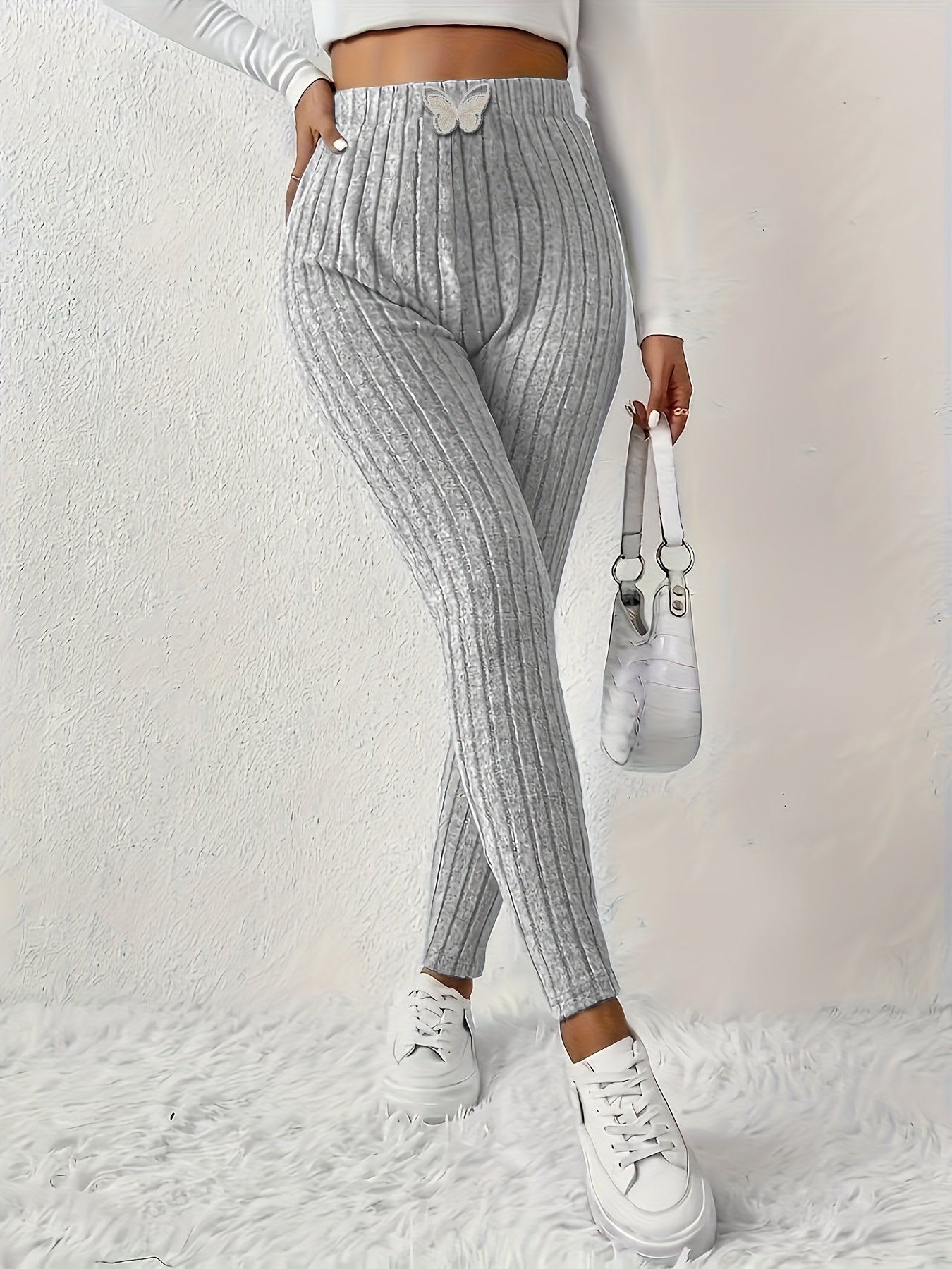 Leggings da donna a coste con vita alta e dettaglio a farfalla