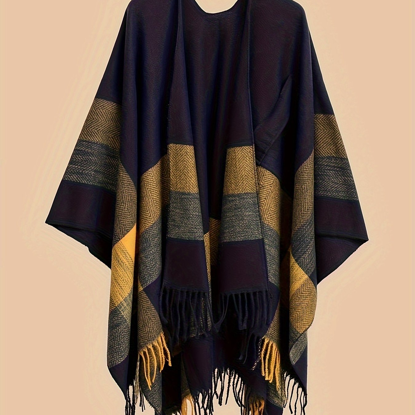 Poncho capa de mujer con flecos y frente abierto