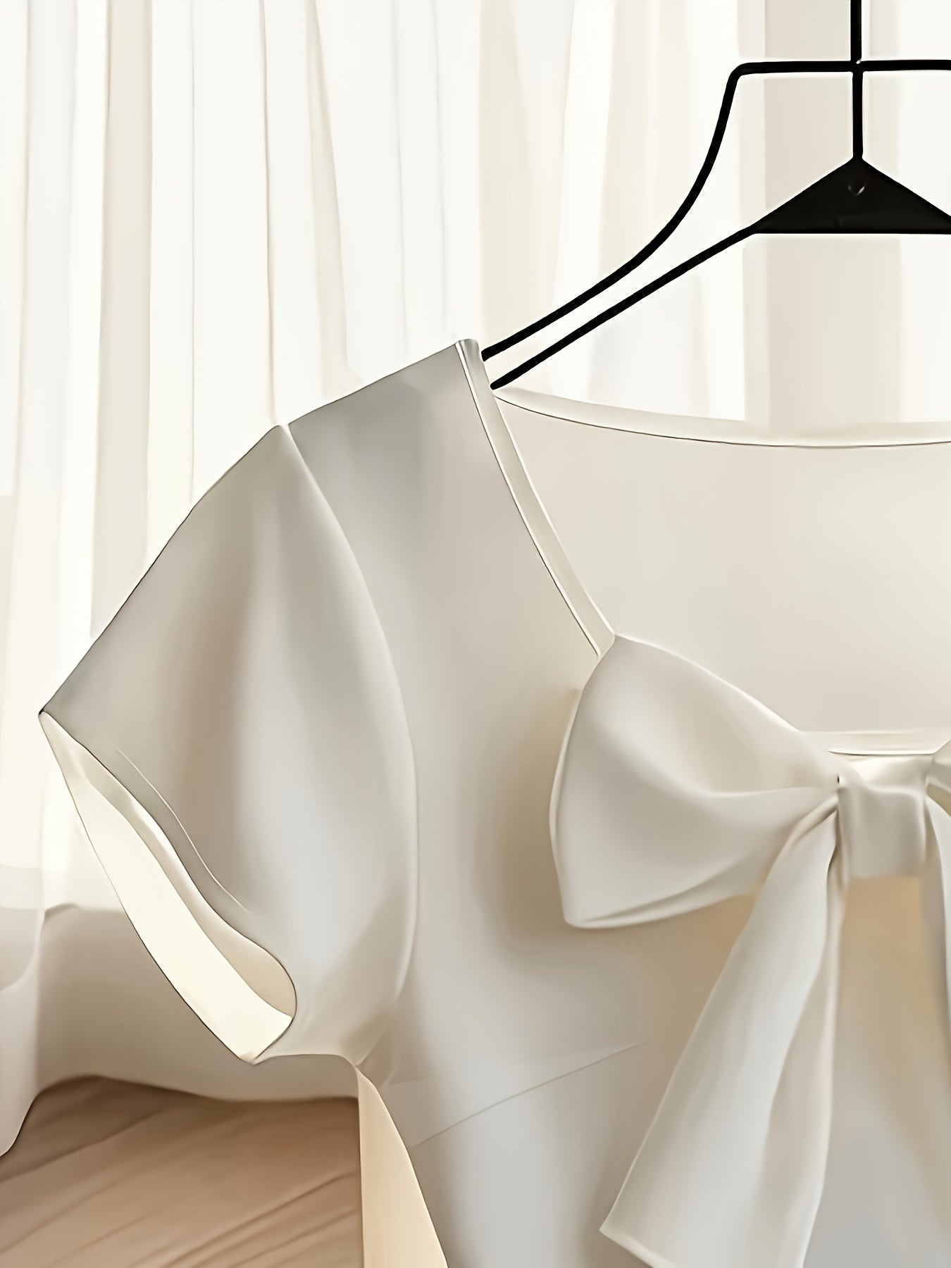 Blusa de mujer con lazo y manga corta – Estilo elegante y femenino para oficina y tiempo libre