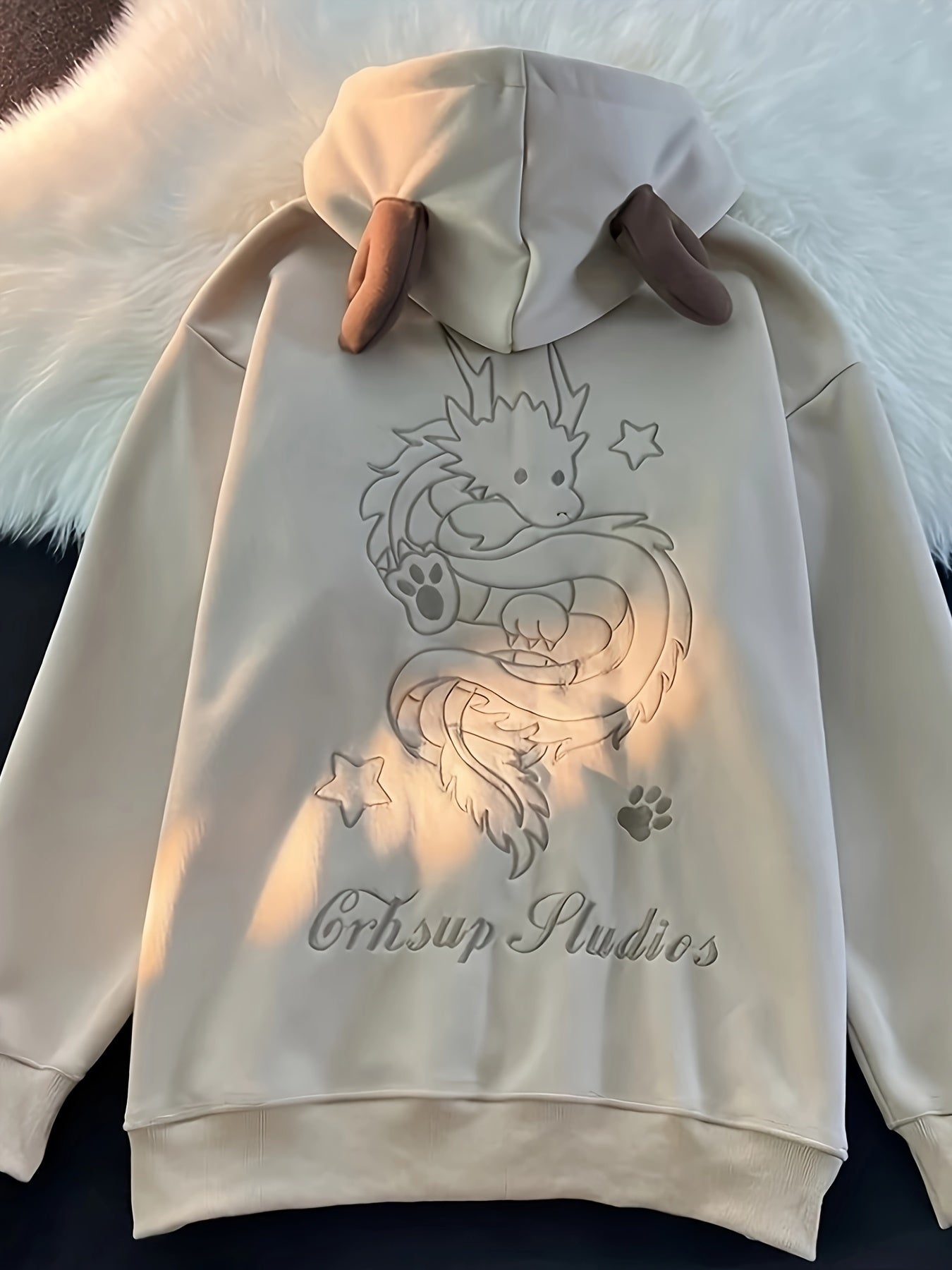 Uniseks hoodie met ritssluiting en capuchon, drakenborduursel en rendiergeweiën