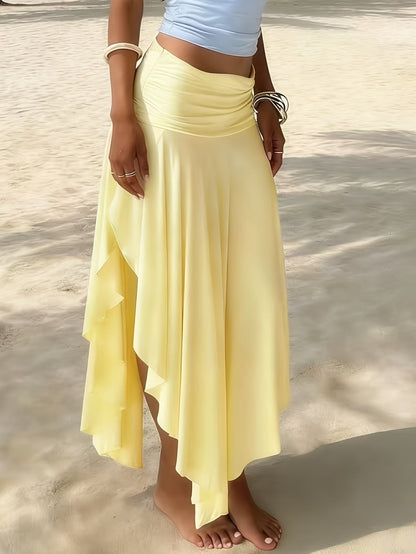 Jupe longue femme plage asymétrique coupe mouchoir mode resort