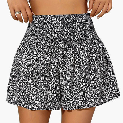 Dame sommershorts med blomsterprint og smock-midje – fritid og ferie