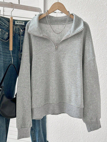 Grijze sweater met ritskraag