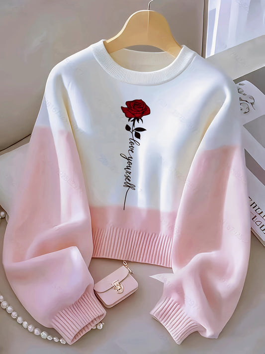 Dame-sweatshirt i creme-rosa, tofarvet med rosenprint og ribmanchetter