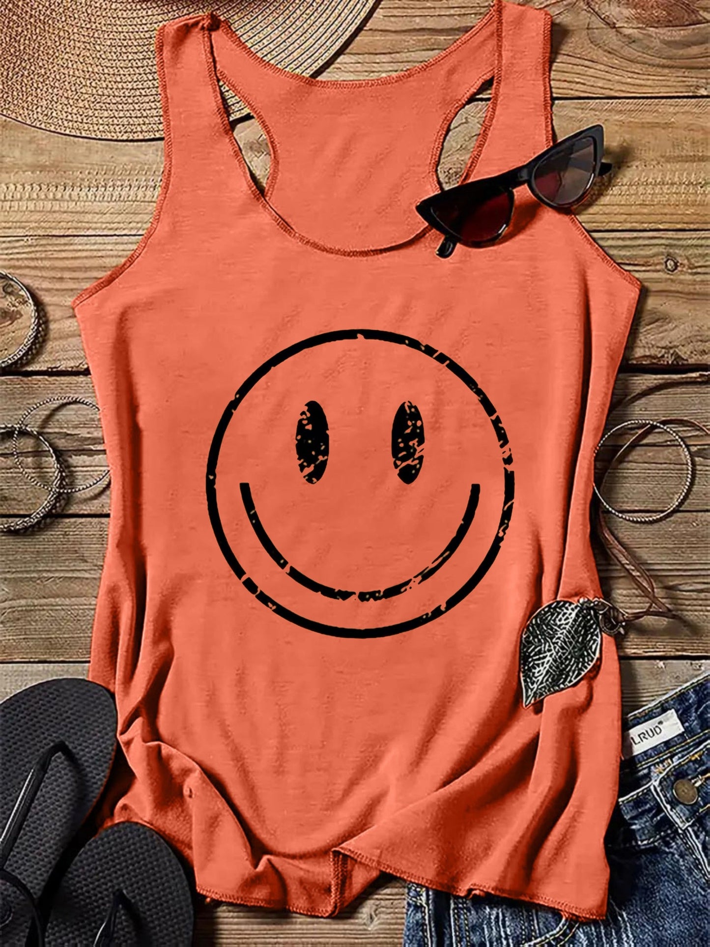 Damski tank top z vintage nadrukiem uśmiechniętej buźki – swobodna letnia koszulka na co dzień