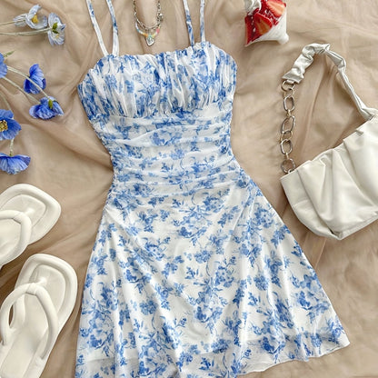 Dame sommerkjole elegant med blomsterprint og spaghetti-stropper – Perfekt til ferie og fritid