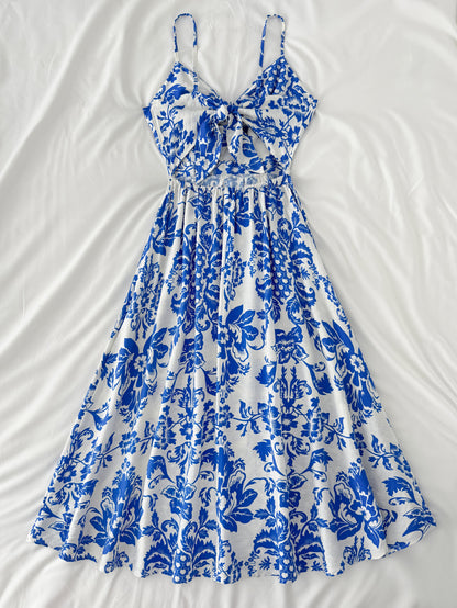 Robe midi d'été pour femme avec motif floral et découpe, tendance et féminine, idéale pour les loisirs et les vacances