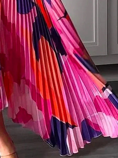 Chelsea – Vestido fluido con escote en V profundo y diseño de espalda descubierta