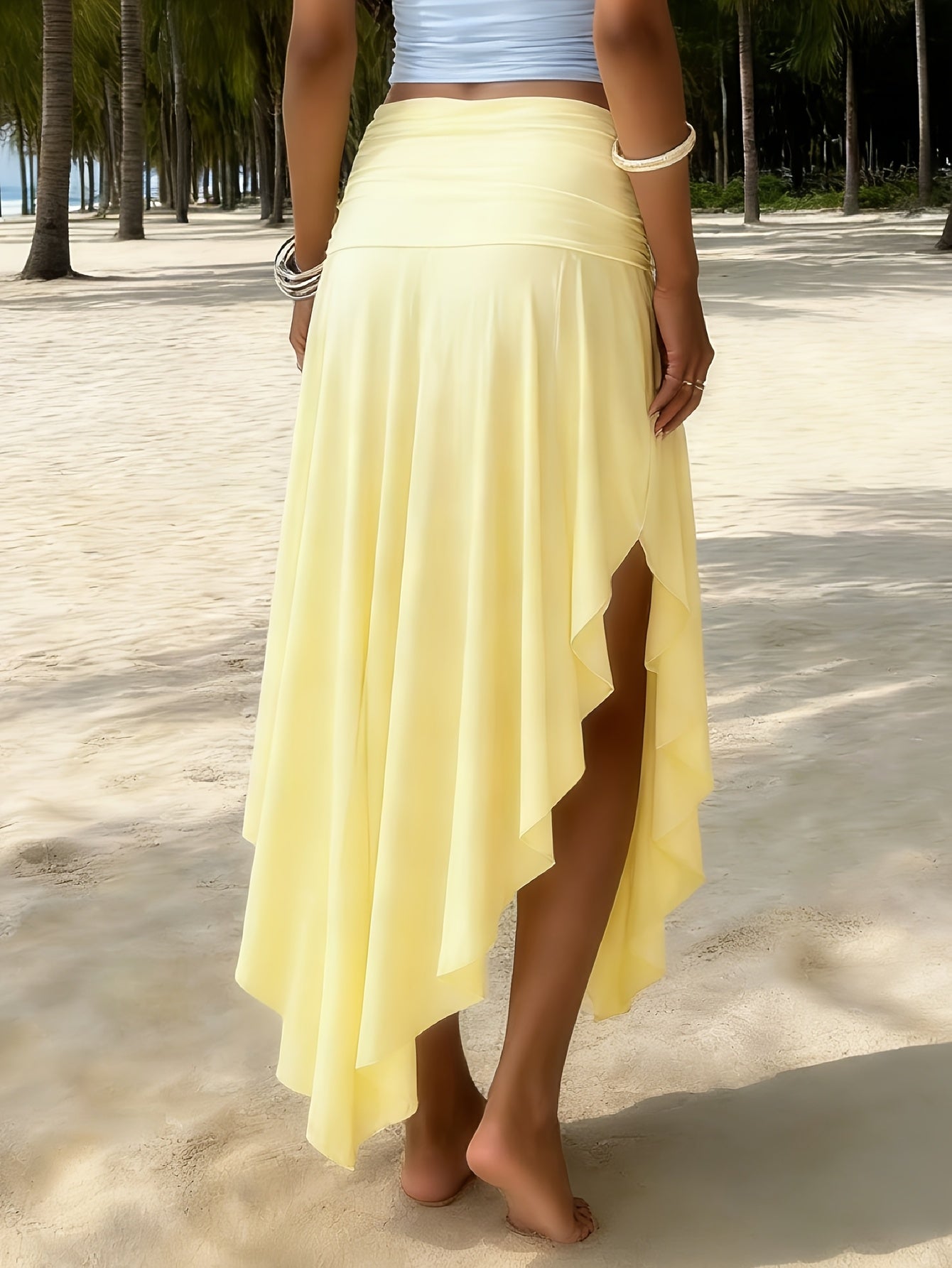Jupe longue femme plage asymétrique coupe mouchoir mode resort