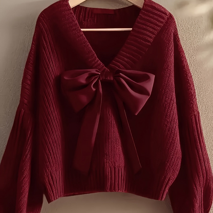 Pullover da donna in maglia grossa con scollo a V e grande fiocco