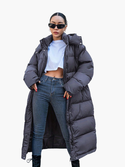 Abrigo acolchado largo de invierno para mujer elegante con capucha – Puff urbano moderno para días fríos