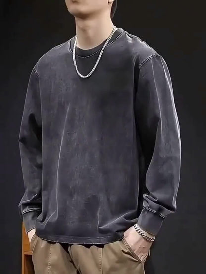 Unisex-langærmet T-shirt i sort med vasket look, stjernemotiv og oversize-pasform