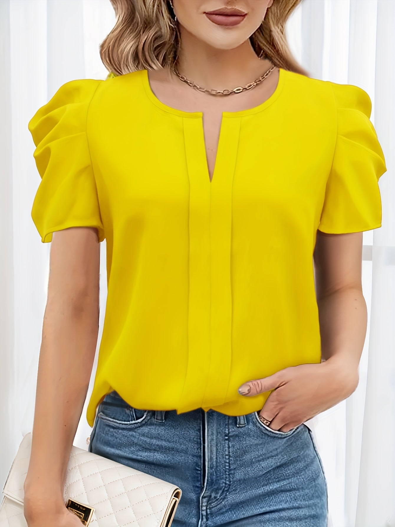 Damebluse med pufferm og moderne snitt – Elegant kontor- og fritidsmote