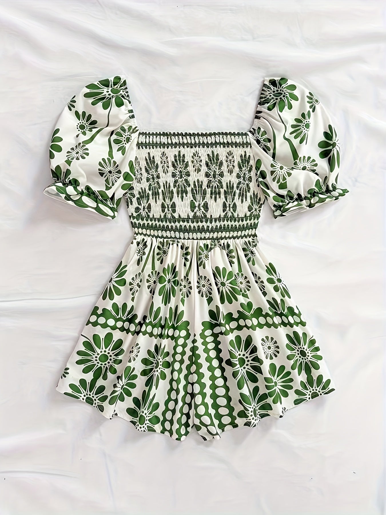 Dame vintage-jumpsuit med pufærmer og blomsterprint – Elegant heldragt til sommer og fritid