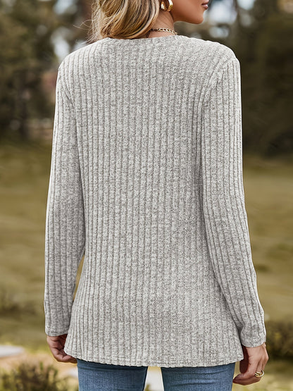 Langærmet dameshirt med rund hals og hjerteapplikation