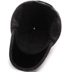Klassieke wintermuts met oorflappen in snapback-stijl