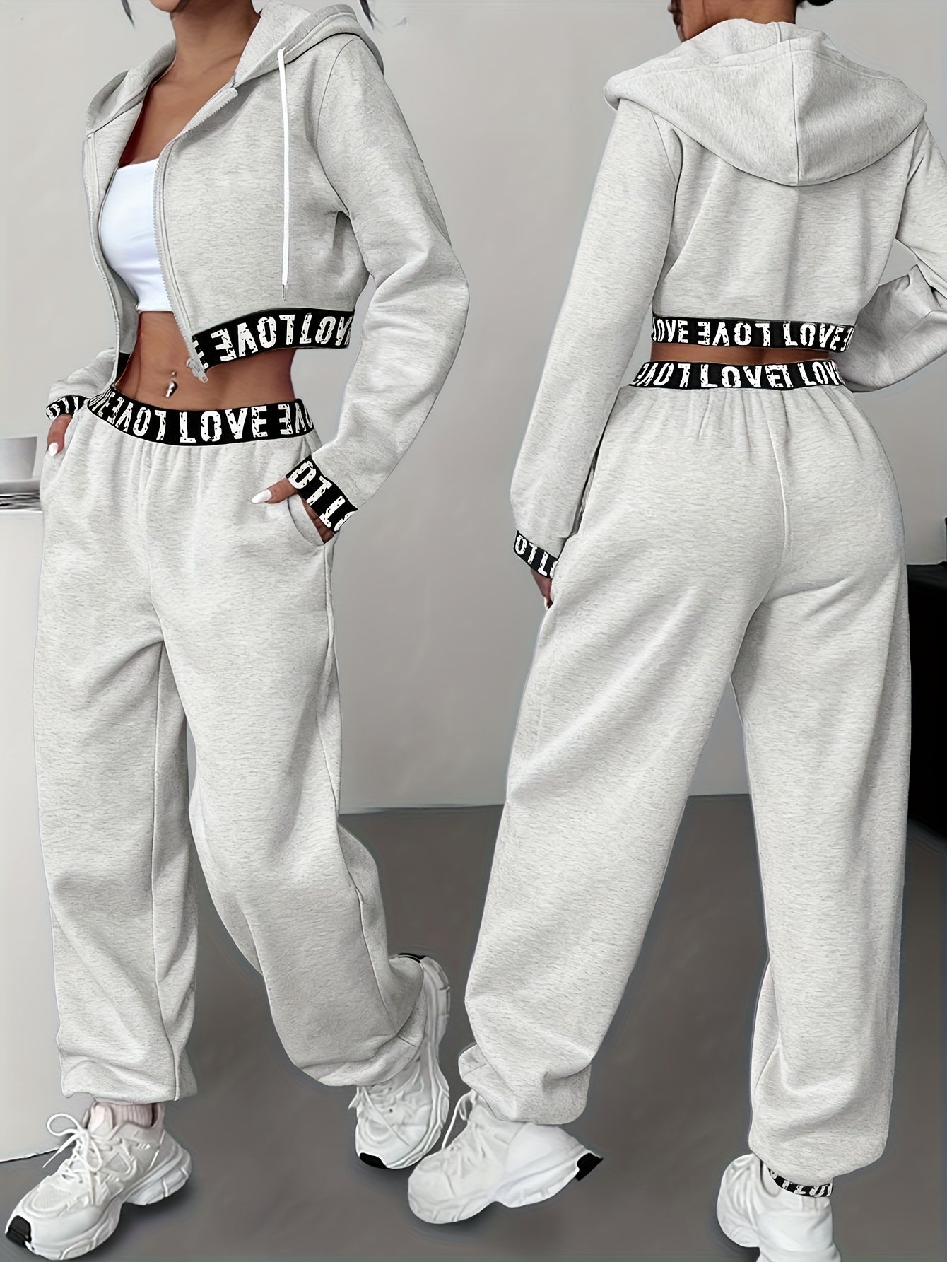 Sportieve dames-loungewear-tweedelige set met cropped hoodie en broek, band met het opschrift ‘LOVE’