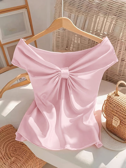 Dam Off-Shoulder-blus med rosett – elegant festlook