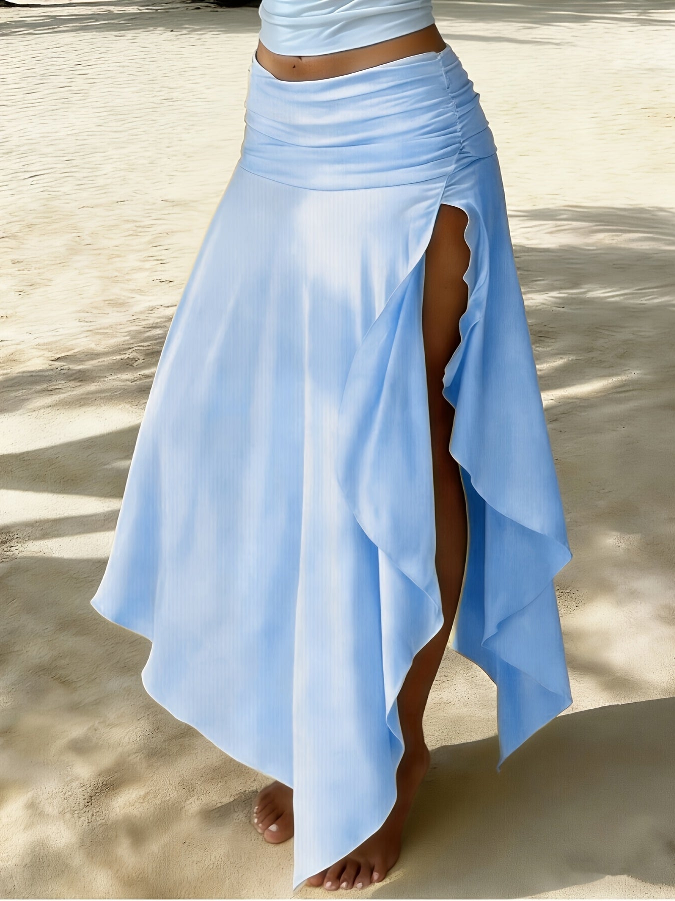 Jupe longue femme plage asymétrique coupe mouchoir mode resort