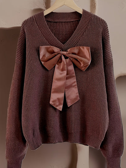 Pullover da donna in maglia grossa con scollo a V e grande fiocco